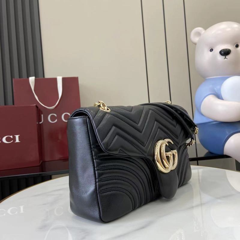 Черная сумка Gucci с золотой фурнитурой