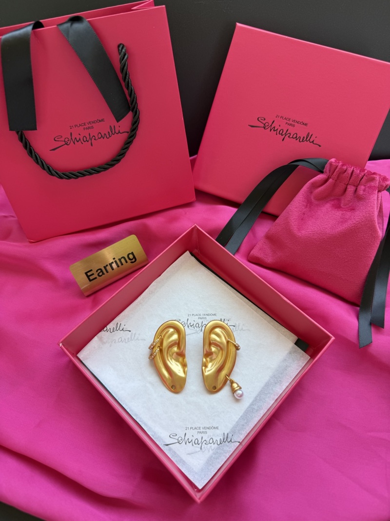 Серьги в форме уха с жемчугом Schiaparelli