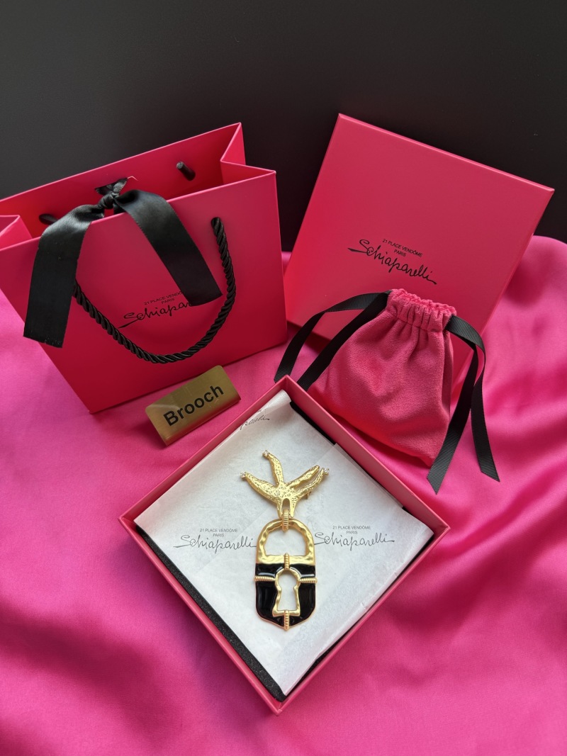 Брошь Schiaparelli