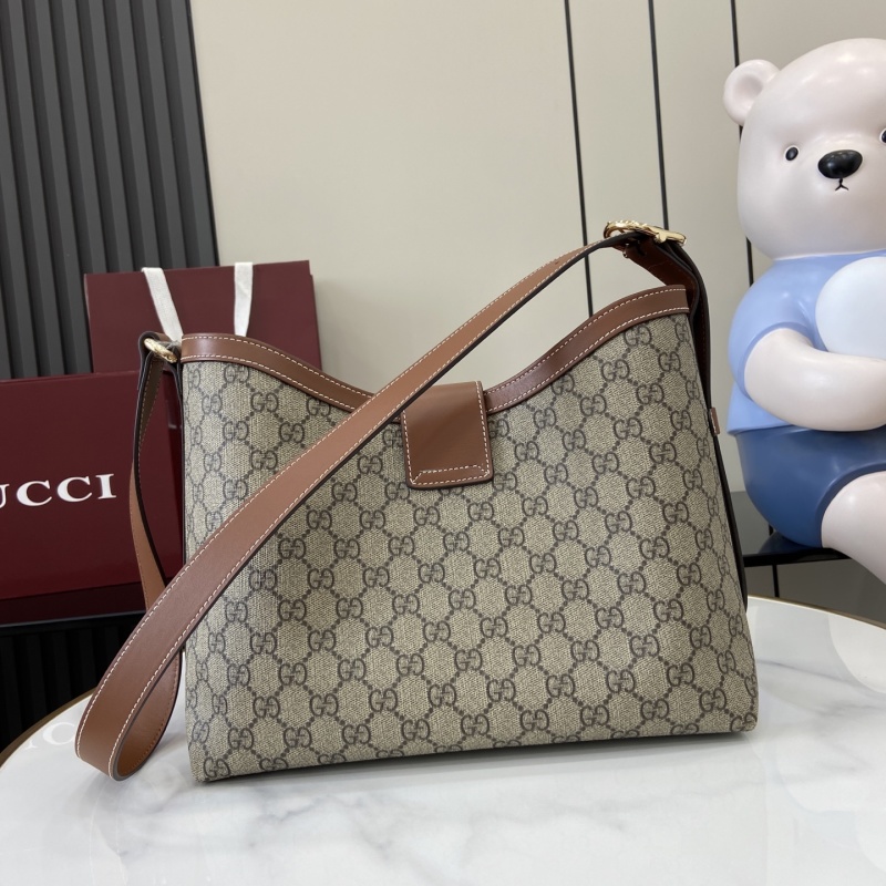 Сумка Gucci с замком и монограммой