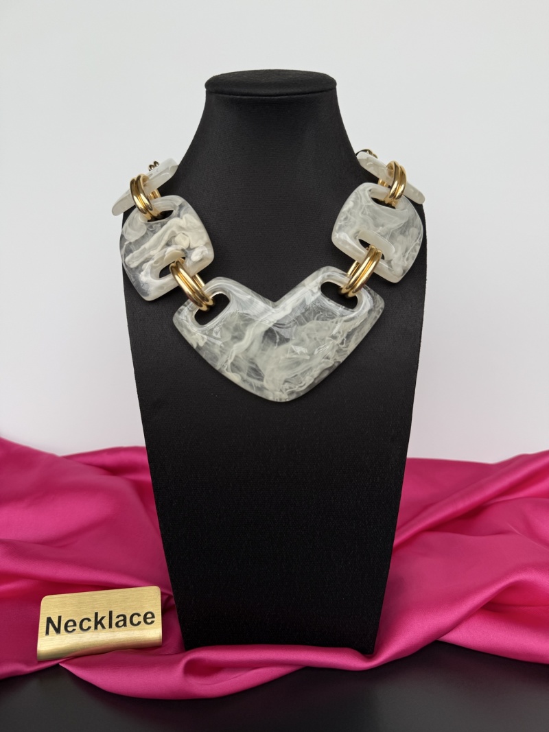 Наручное колье с геометрическими элементами Schiaparelli