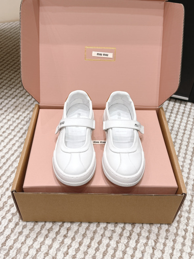 Женские кожаные кеды Miu Miu белые с липучкой
