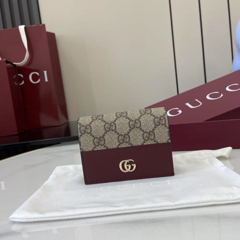 Портмоне Gucci с монограммой и логотипом GG