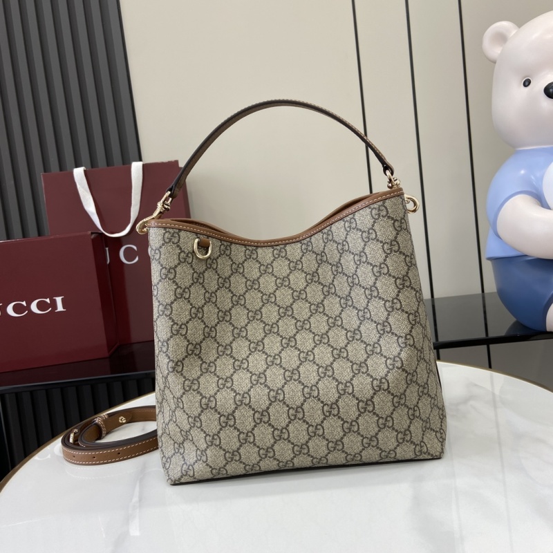 Сумка Gucci с монограммой и кожаной отделкой
