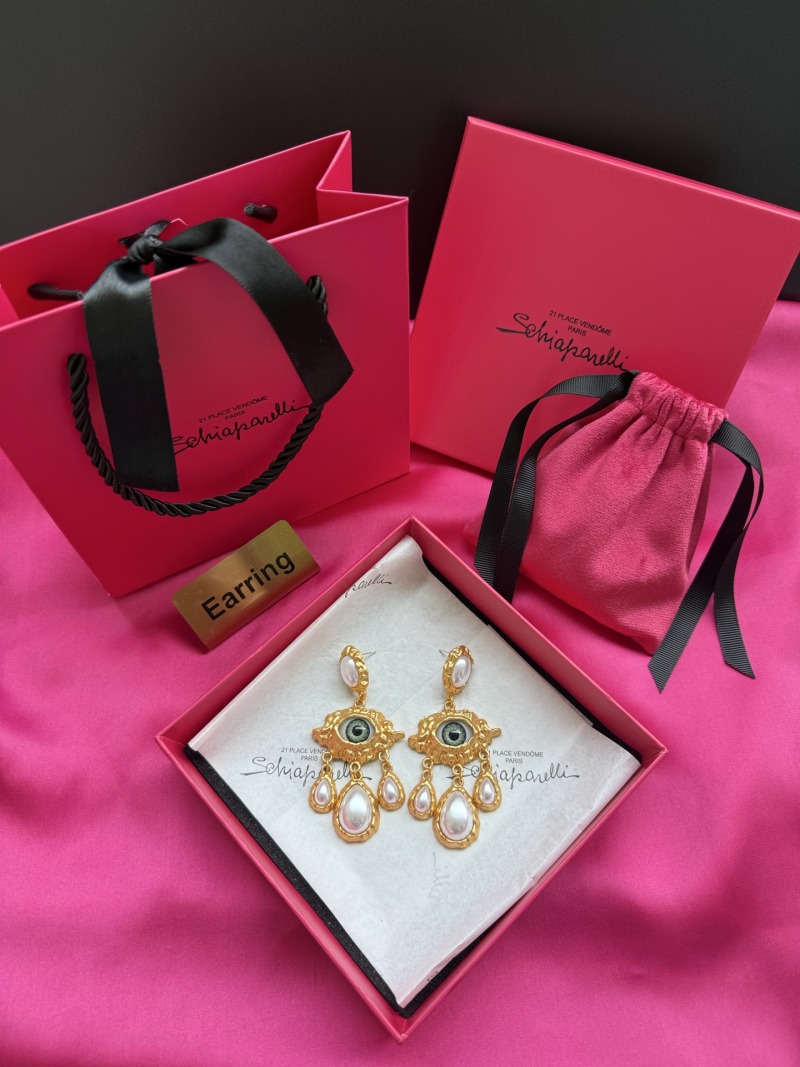 Серьги Schiaparelli с глазом и жемчугом