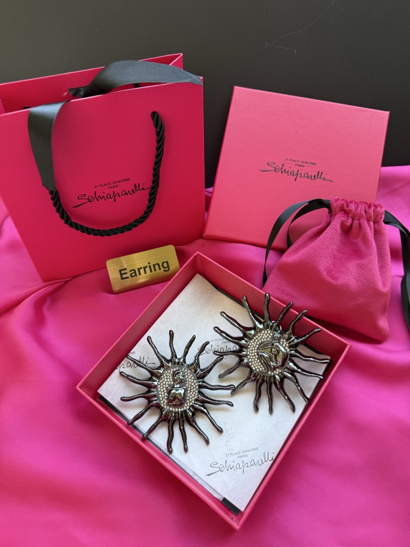 Серьги в форме солнца с лицом Schiaparelli