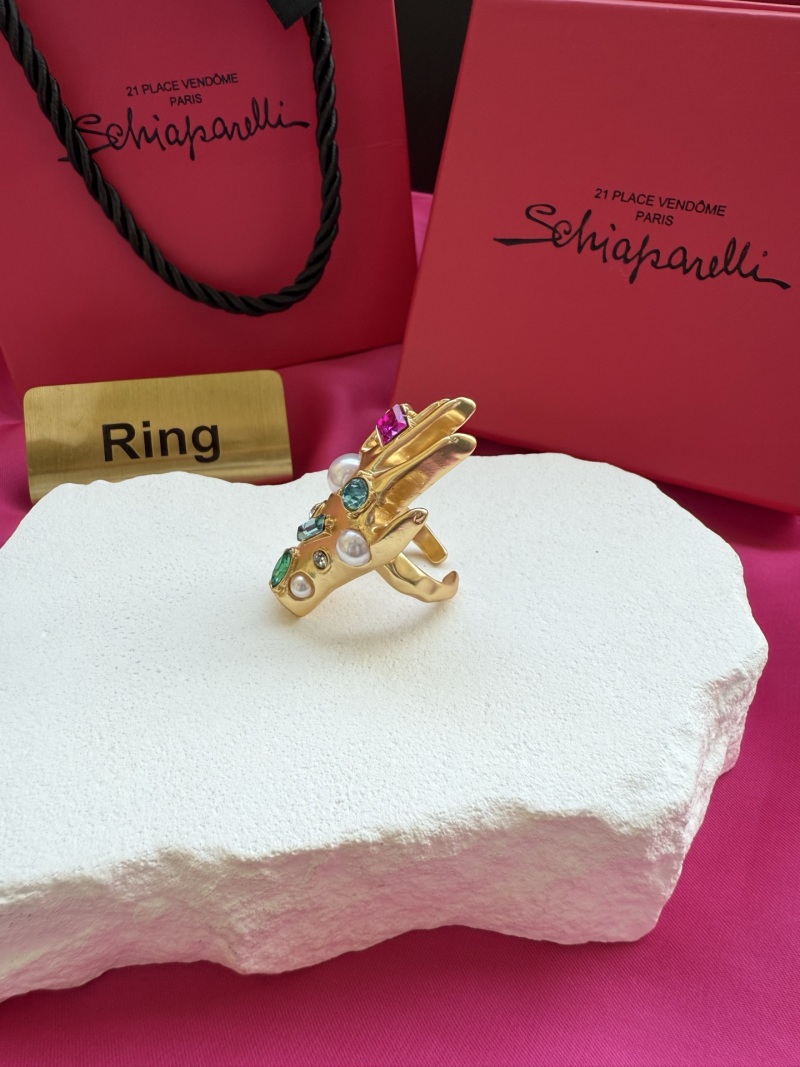 Кольцо в виде руки с камнями Schiaparelli