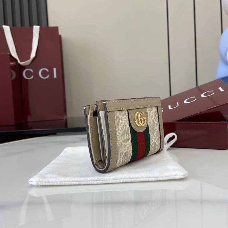 Кошелёк Gucci с монограммой и логотипом GG