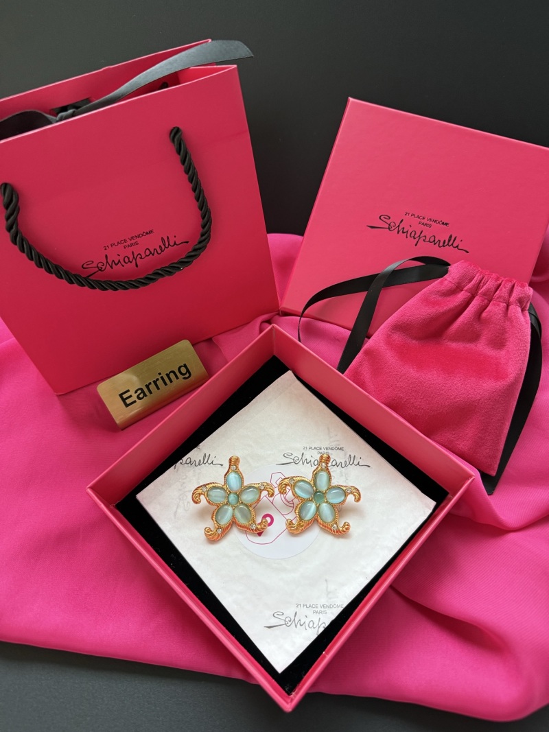 Серьги в форме цветка Schiaparelli