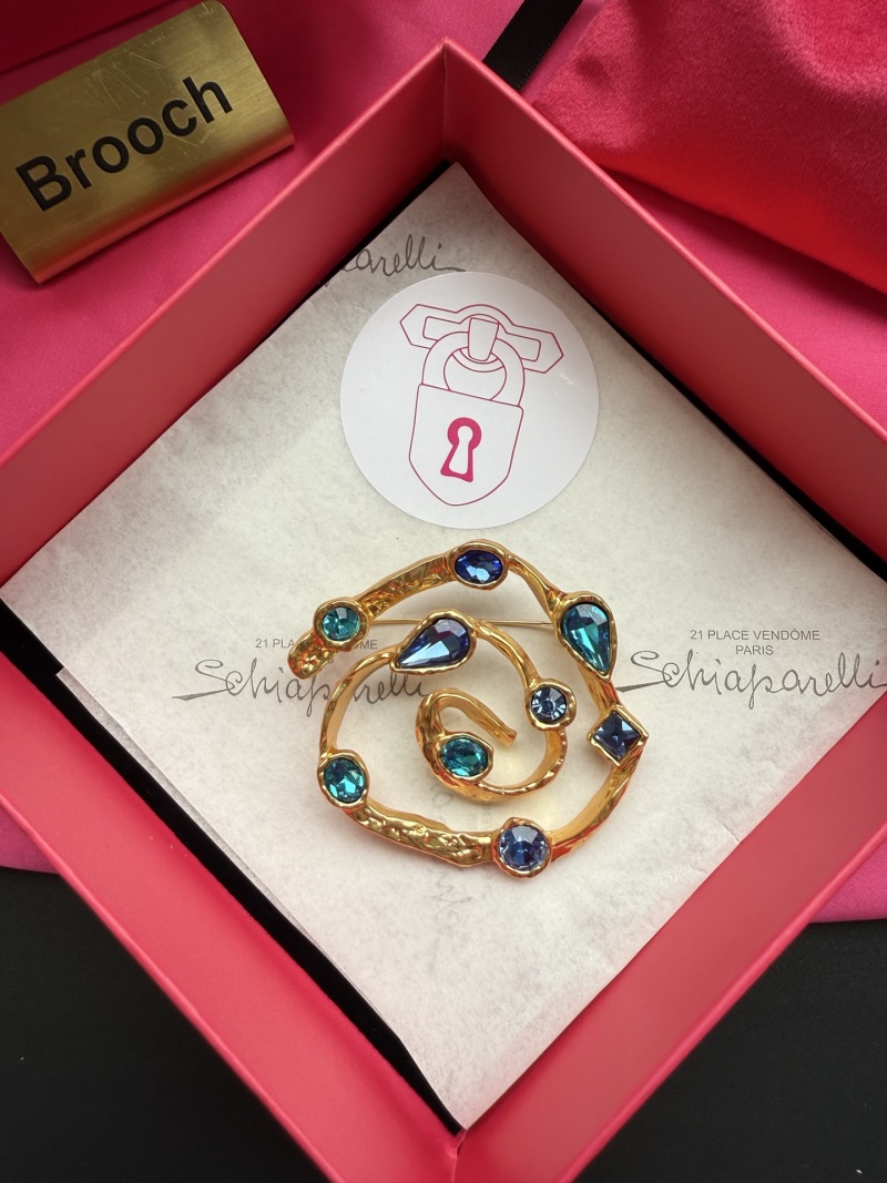 Брошь Schiaparelli