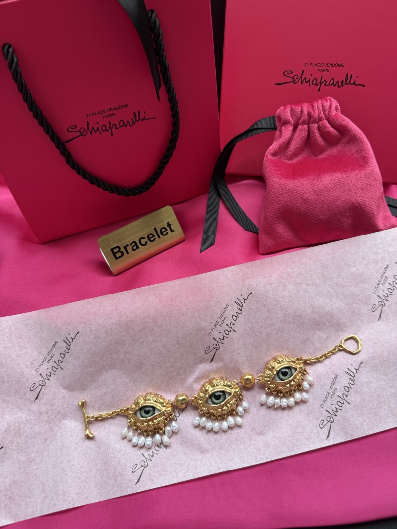 Браслет с глазами и жемчугом Schiaparelli
