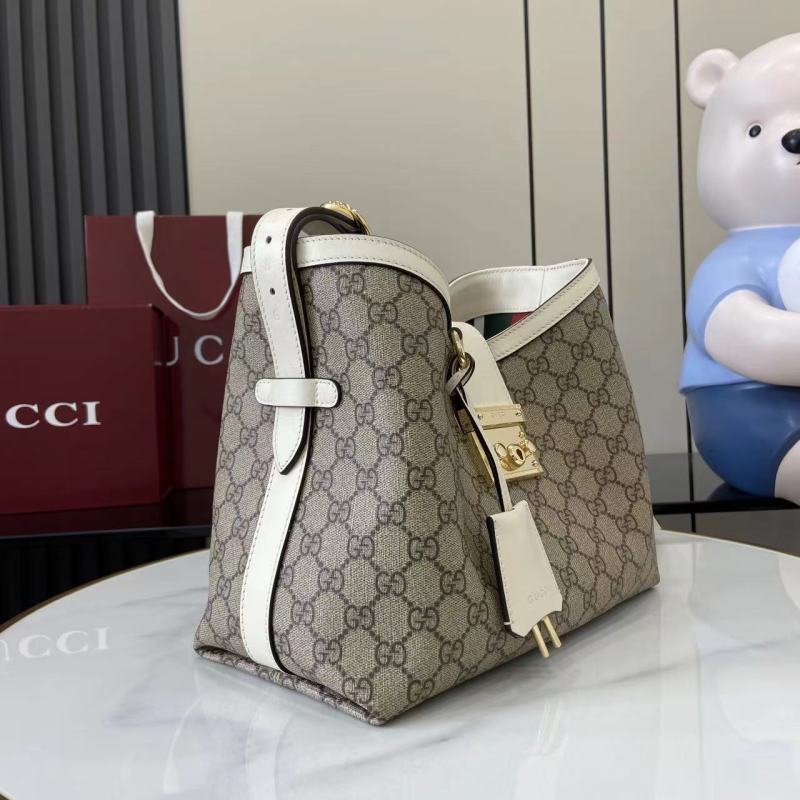 Сумка Gucci с замком и плечевым ремнем