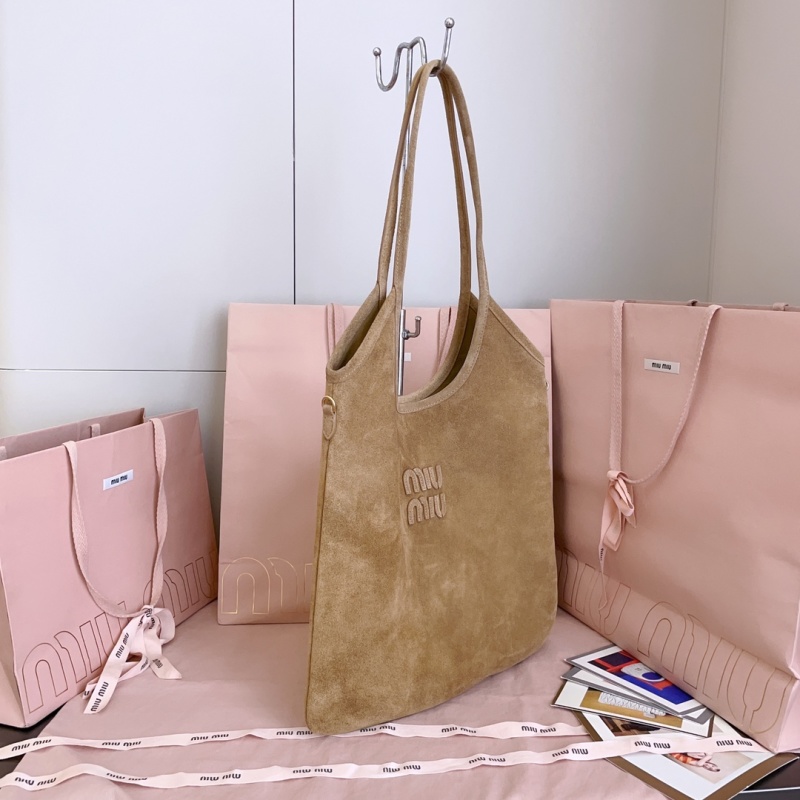 Замшевая сумка бежевого цвета Miu Miu