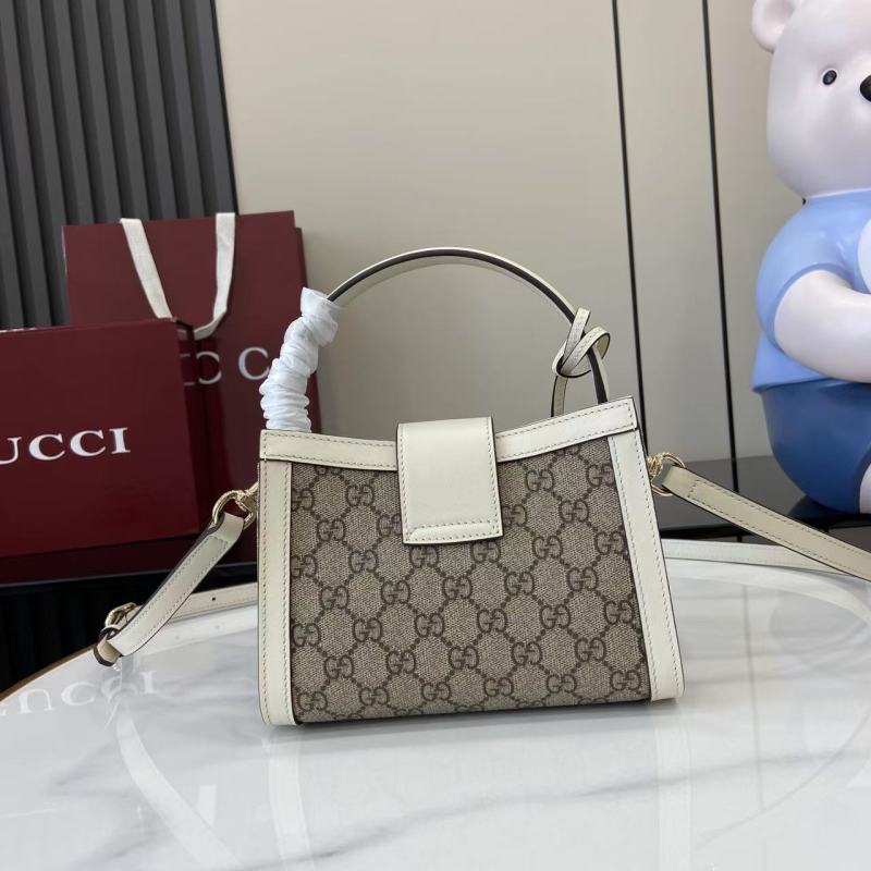 Сумка Gucci с замком и ручкой