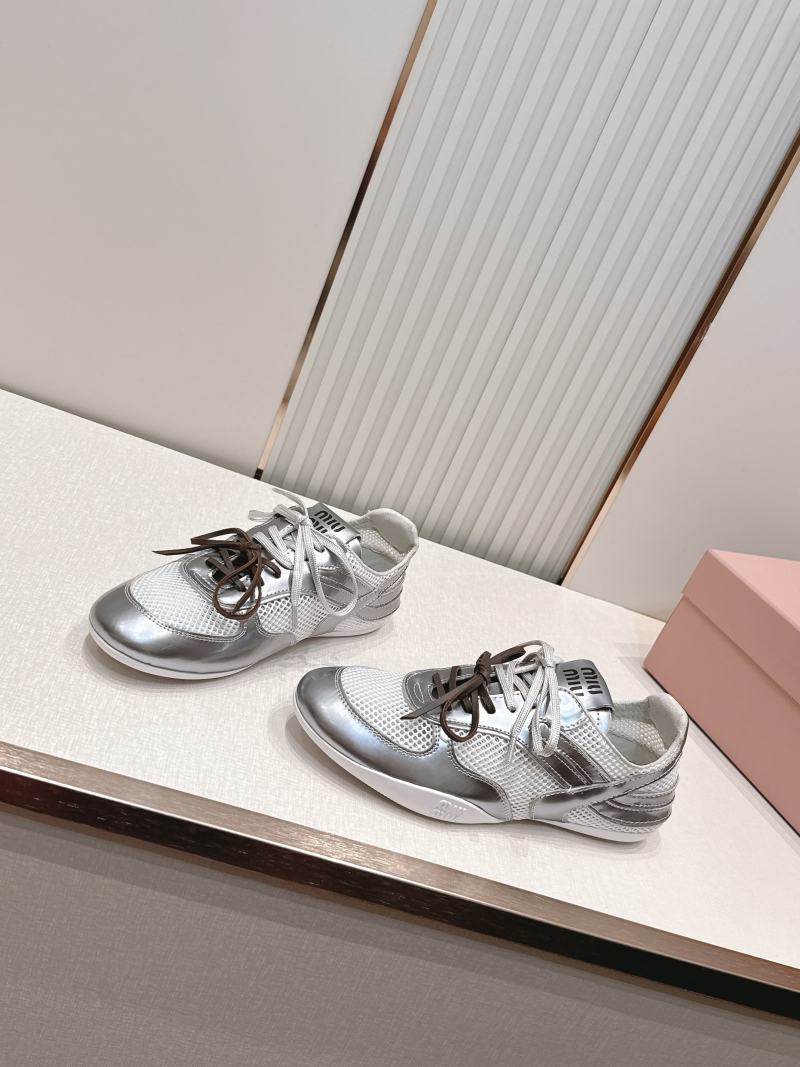 Кроссовки Miu Miu серебристые женские