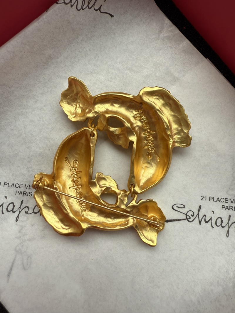 Брошь Schiaparelli в виде двух рыб