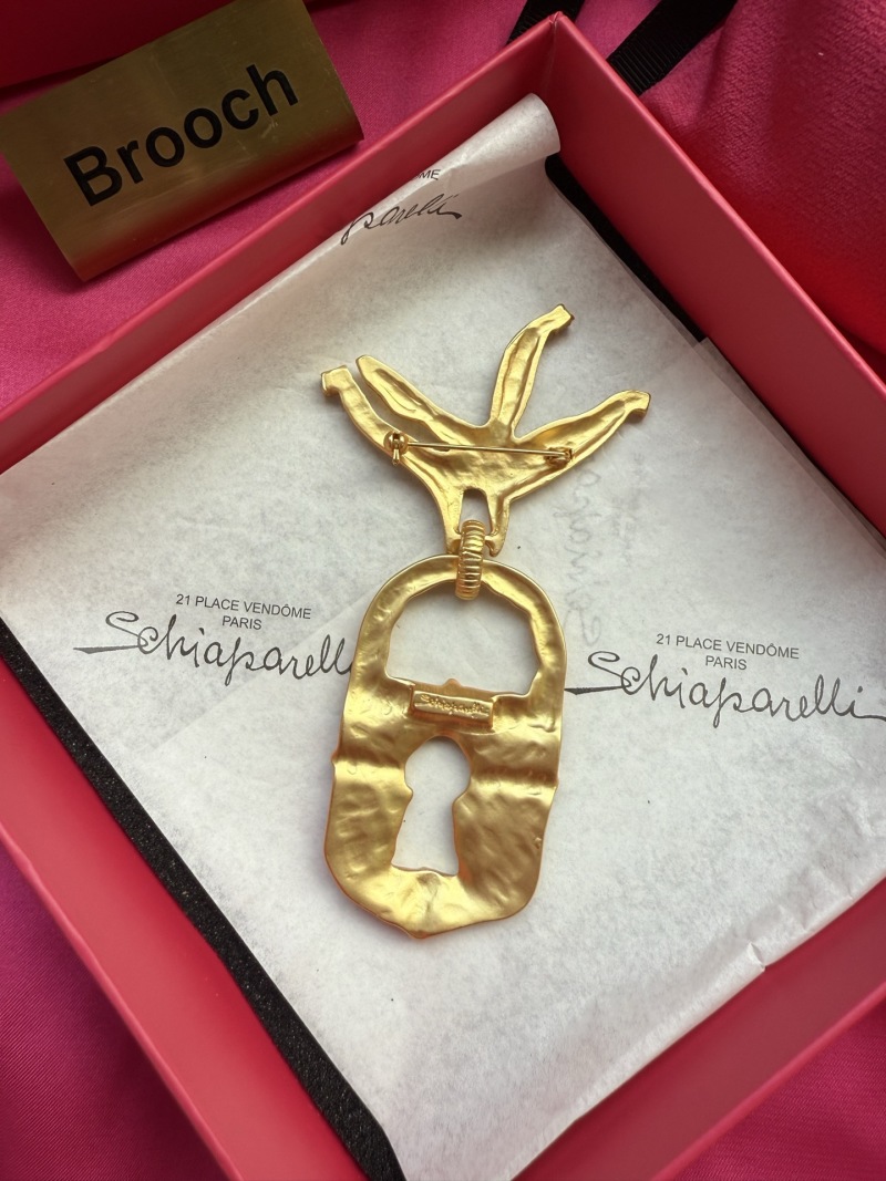 Брошь Schiaparelli