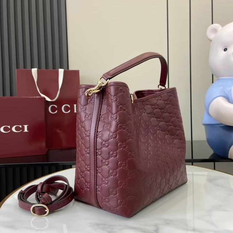 Сумка Gucci бордовая с тиснением