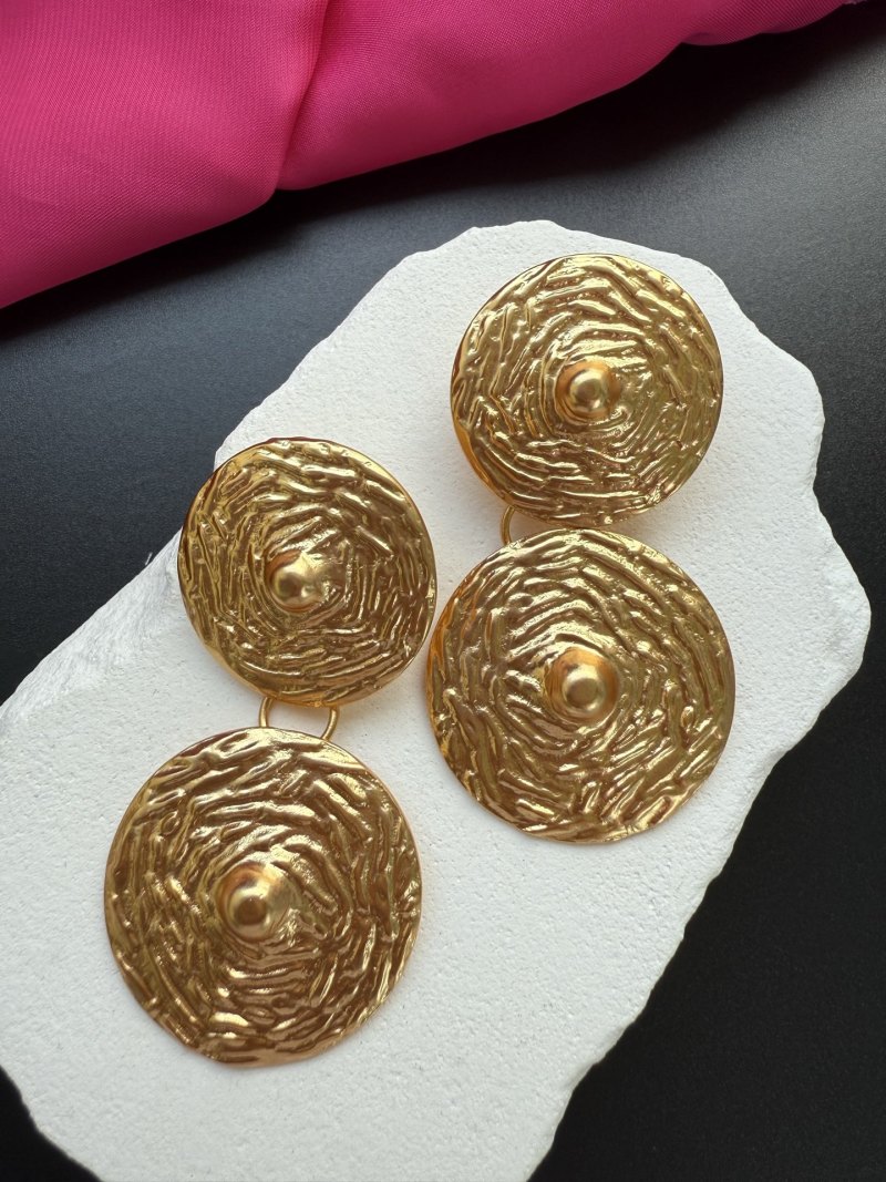 Золотистые серьги Schiaparelli