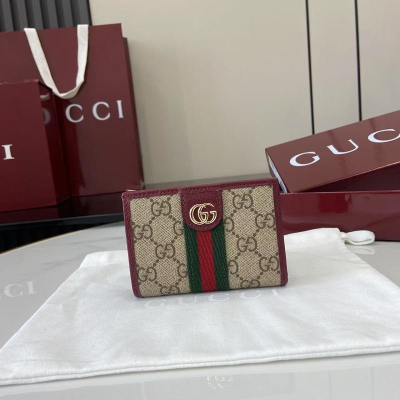 Кошелёк Gucci с монограммой и молнией
