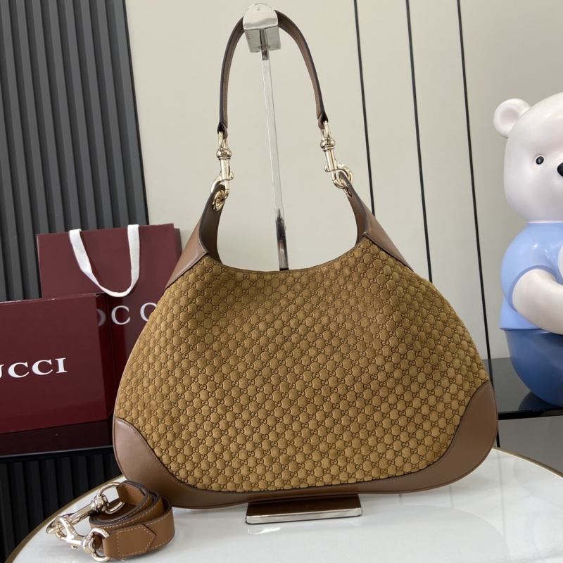 Сумка Gucci с монограммой и кожаной отделкой