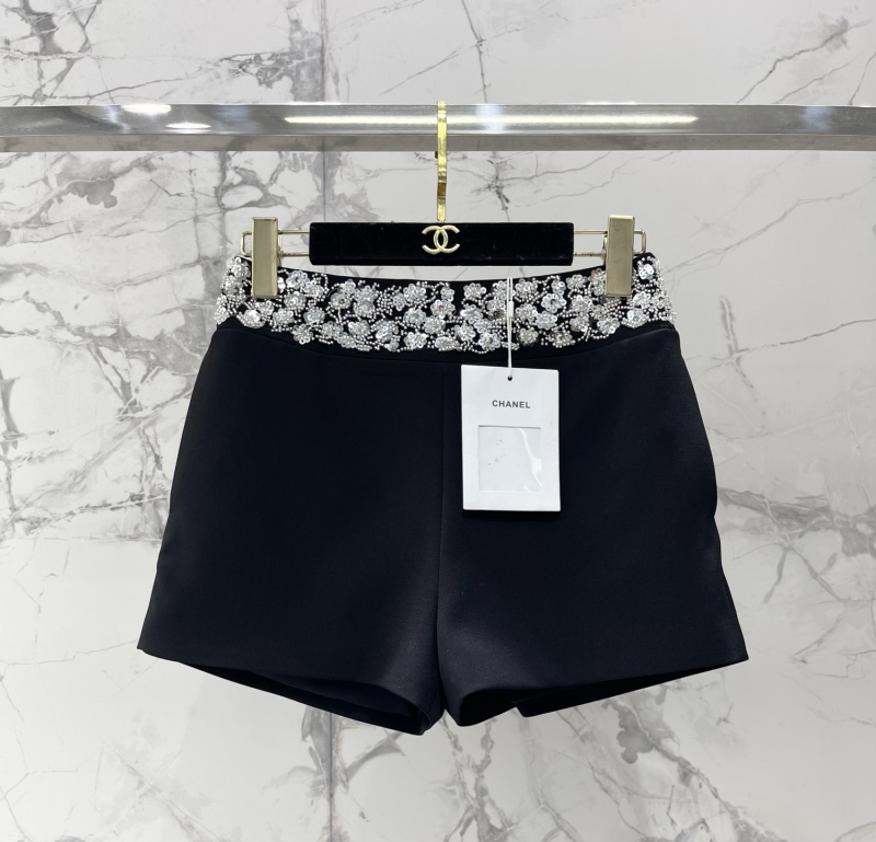 Чёрные брюки Chanel с кружевной отделкой