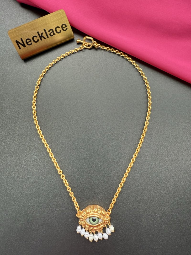 Наручное колье с подвеской в виде глаза Schiaparelli