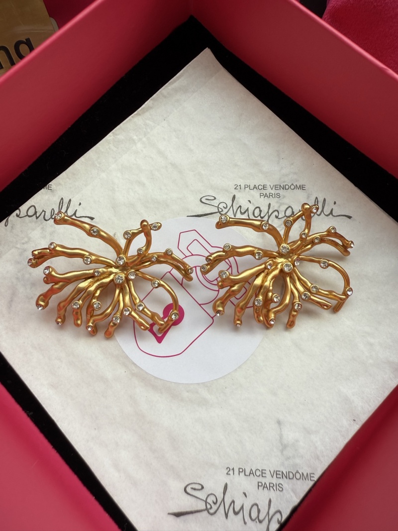 Серьги Schiaparelli в форме паука