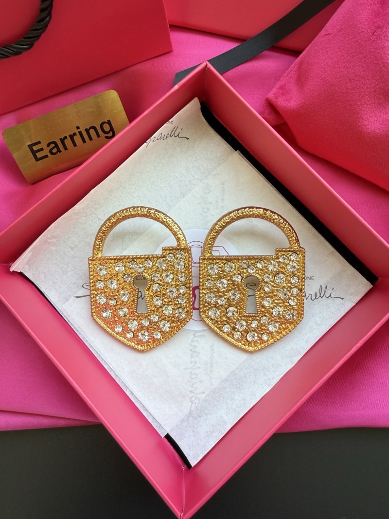 Серьги в виде замков с кристаллами Schiaparelli