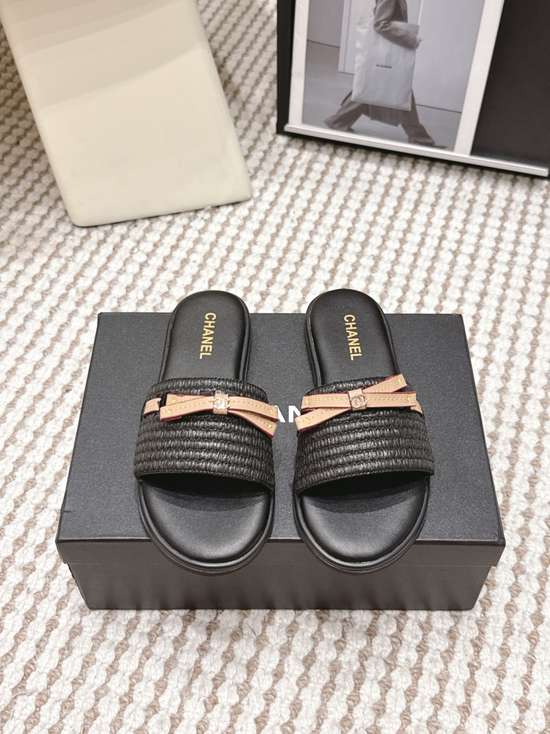 Черные плетеные шлепанцы Chanel с бантом