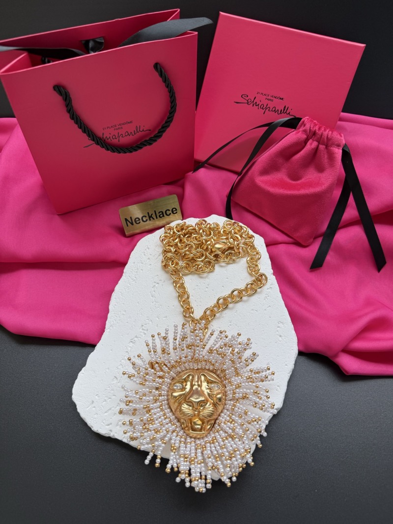 Колье с головой льва Schiaparelli