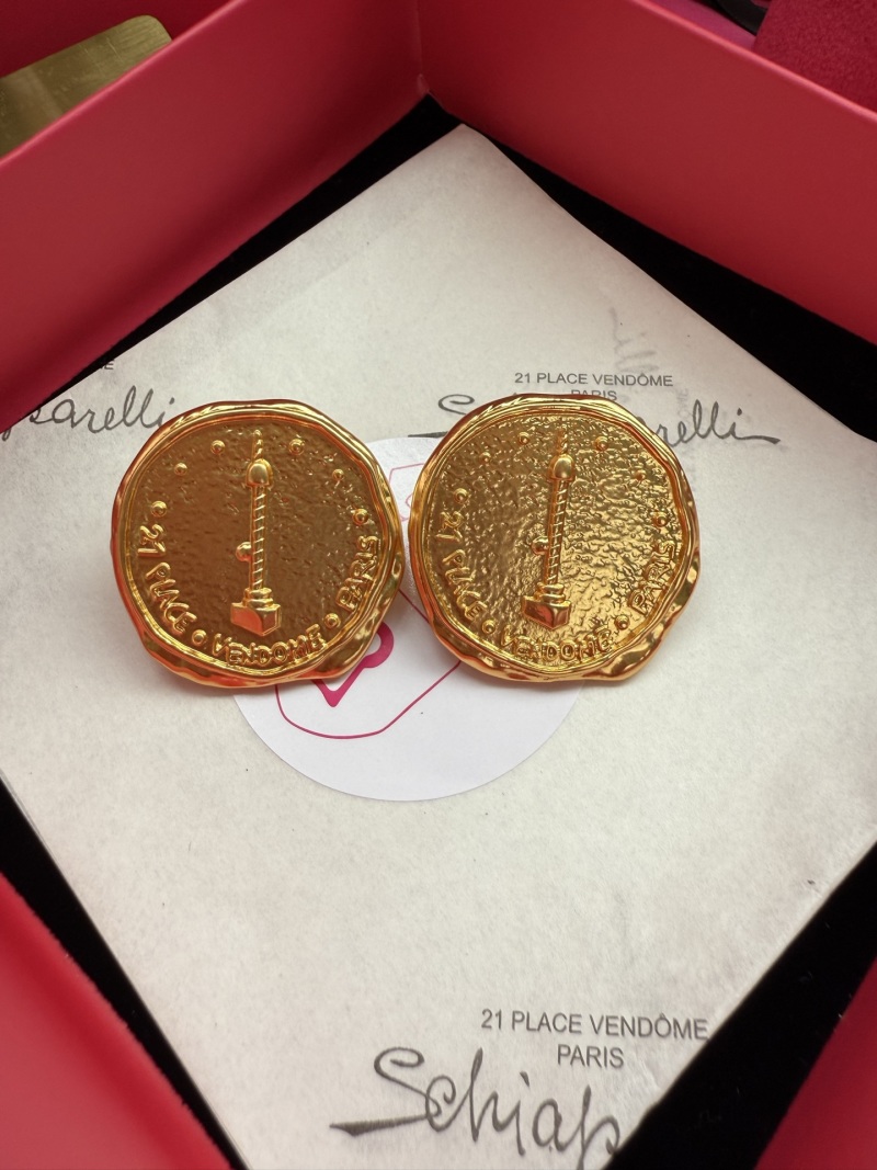 Серьги в форме монеты с изображением Эйфелевой башни Schiaparelli