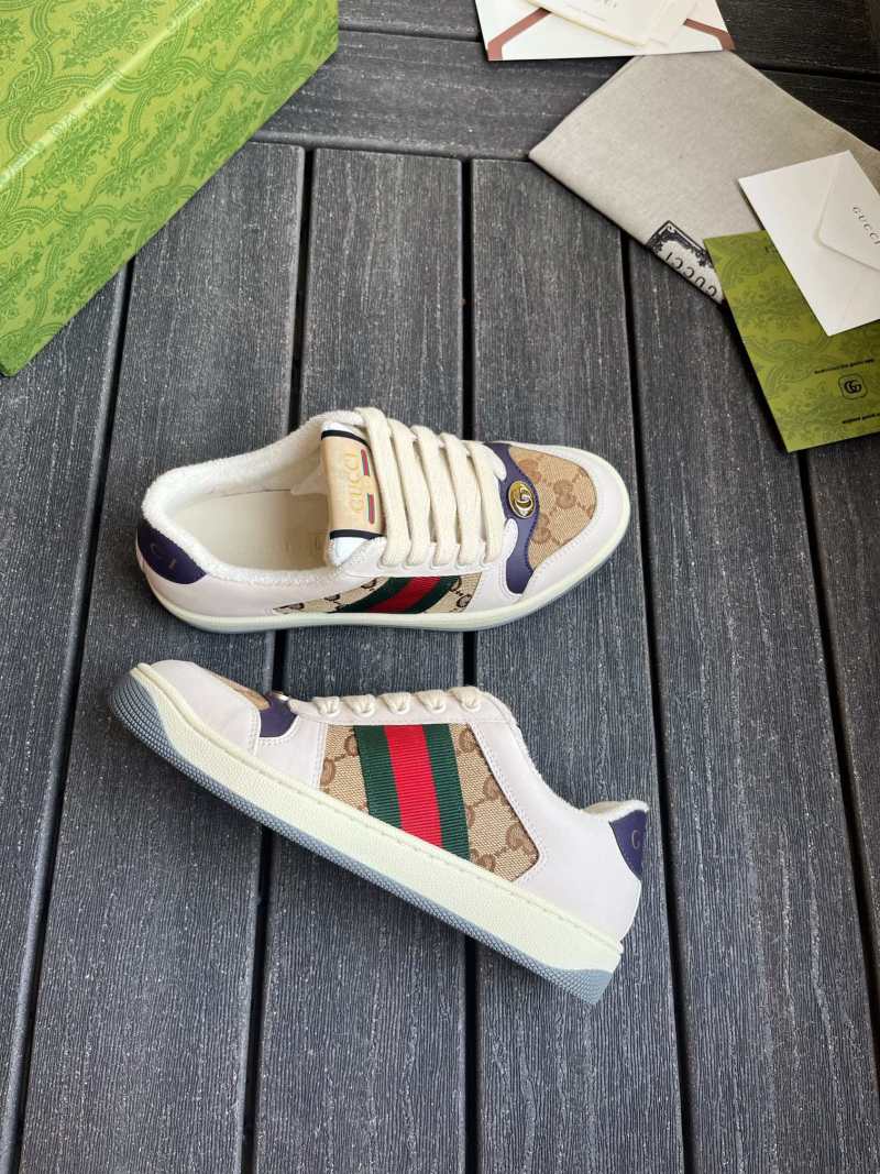 Кроссовки с монограммой и цветными вставками Gucci