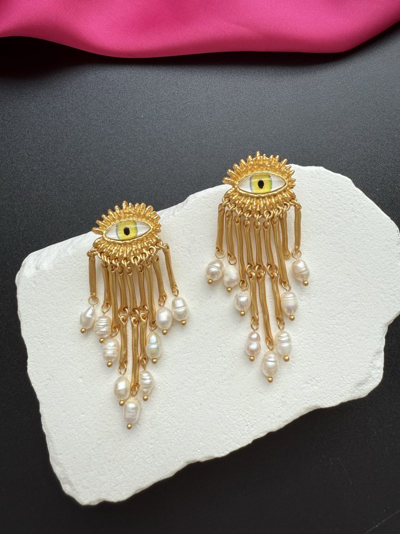 Серьги Schiaparelli с глазом и жемчугом