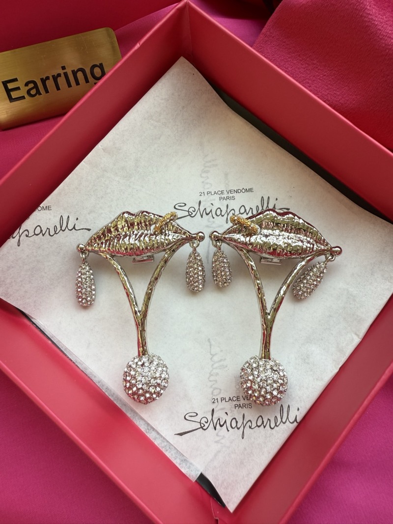 Серьги Schiaparelli в виде губ с кристаллами