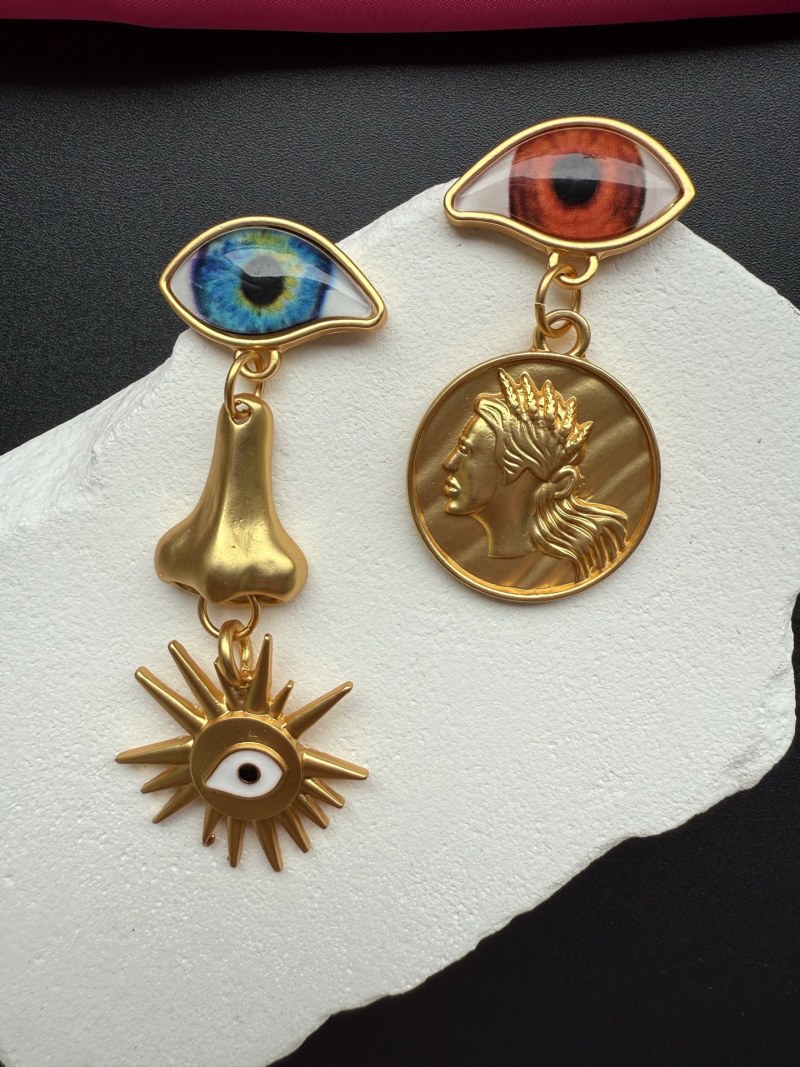Серьги Schiaparelli с глазами и монетой