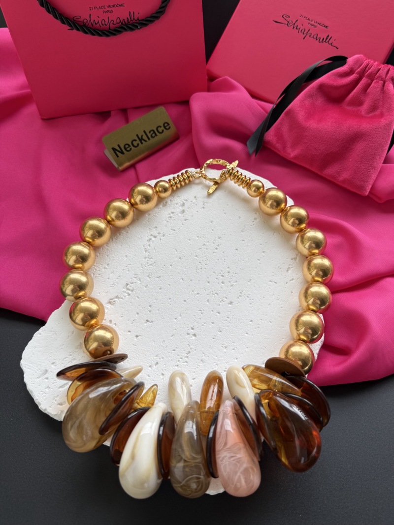 Набор бус из смешанных материалов Schiaparelli