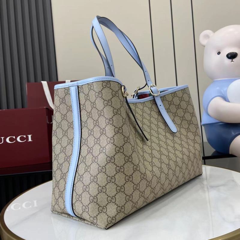 Сумка-тоут Gucci с монограммой и голубыми ручками