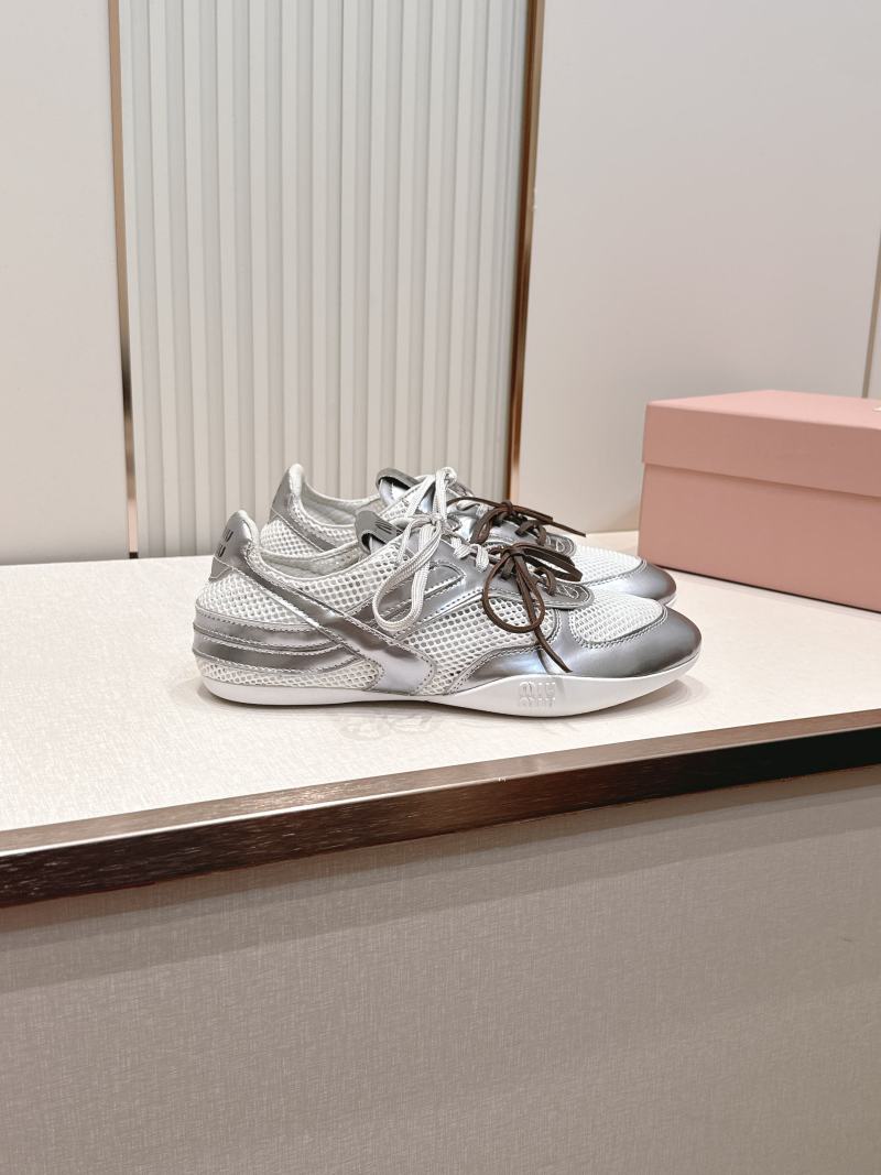 Кроссовки Miu Miu серебристые женские