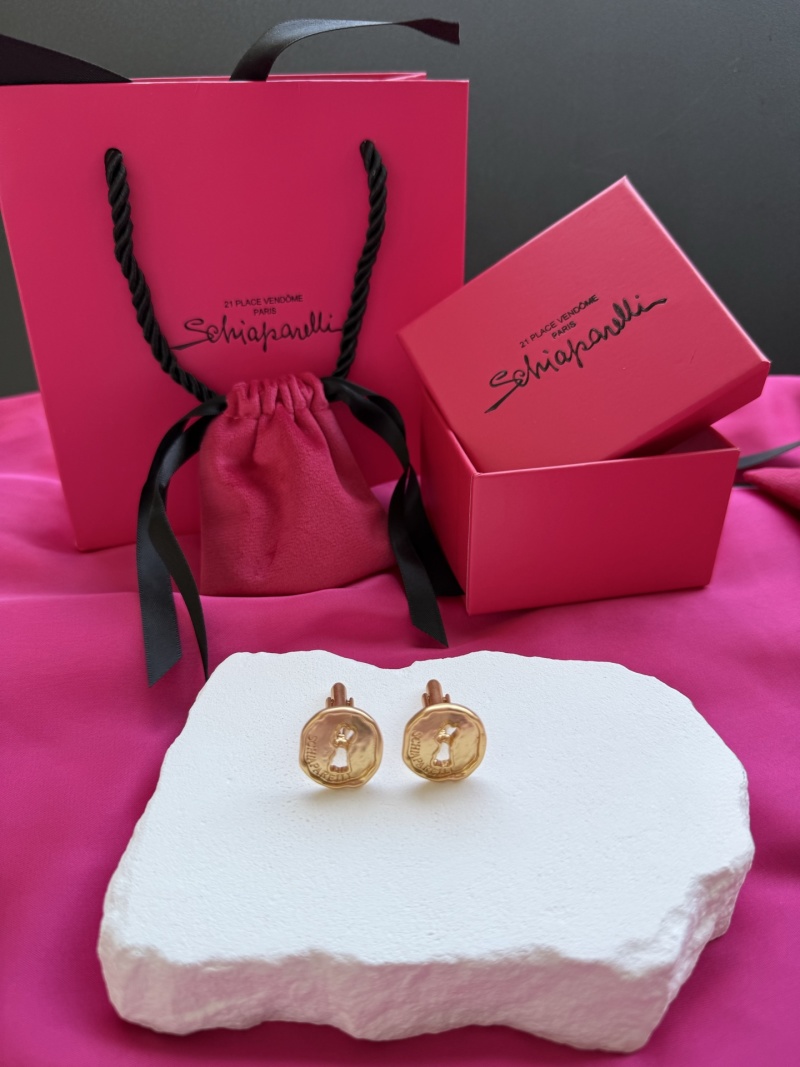 Свободные серьги-капсулы с изображением ключа Schiaparelli