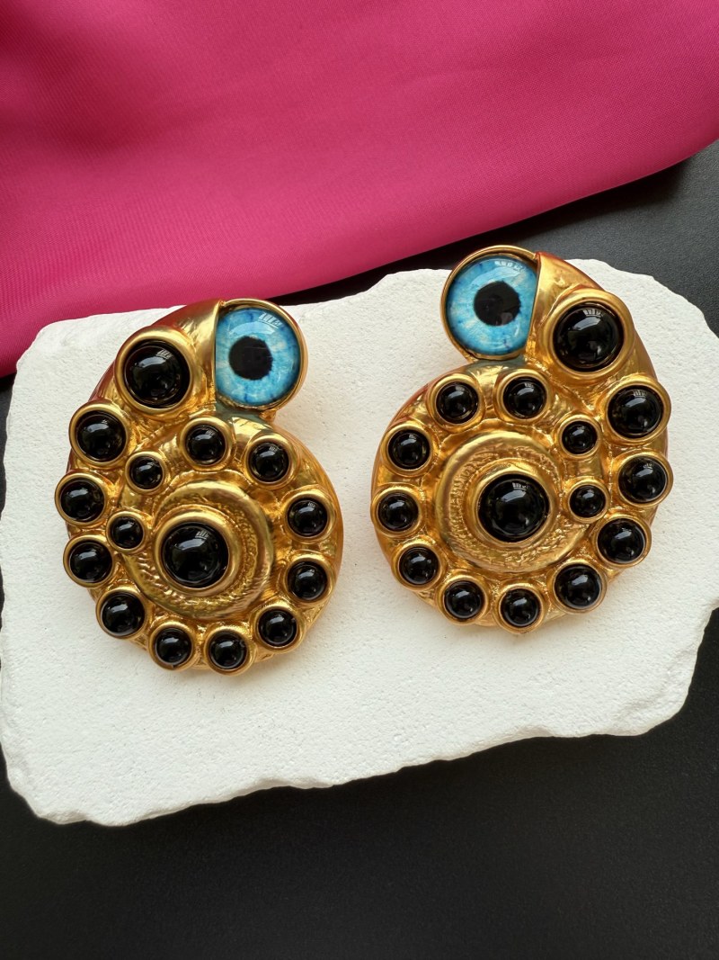 Серьги Schiaparelli с глазами и черными камнями