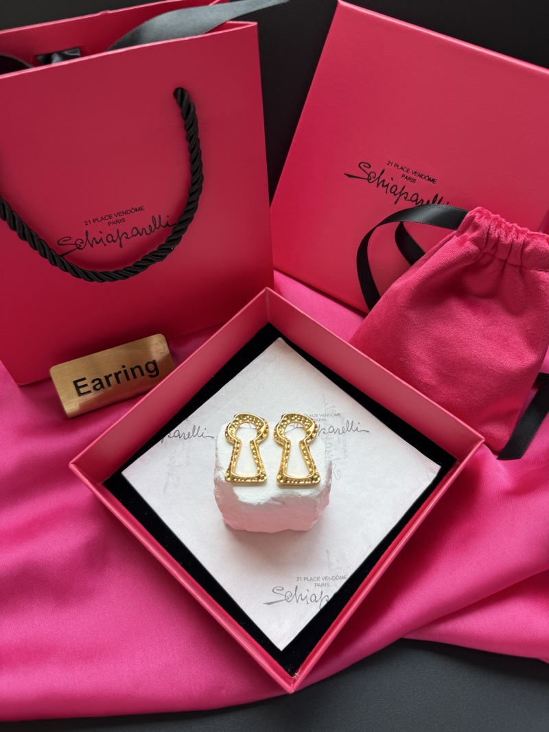 Серьги в форме ключа Schiaparelli