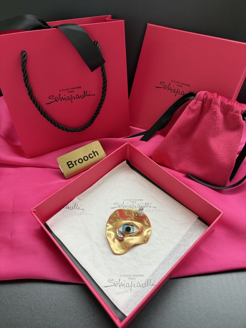 Брошь Schiaparelli