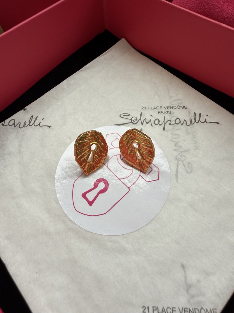 Серьги в форме листа с отверстием в виде ключа Schiaparelli