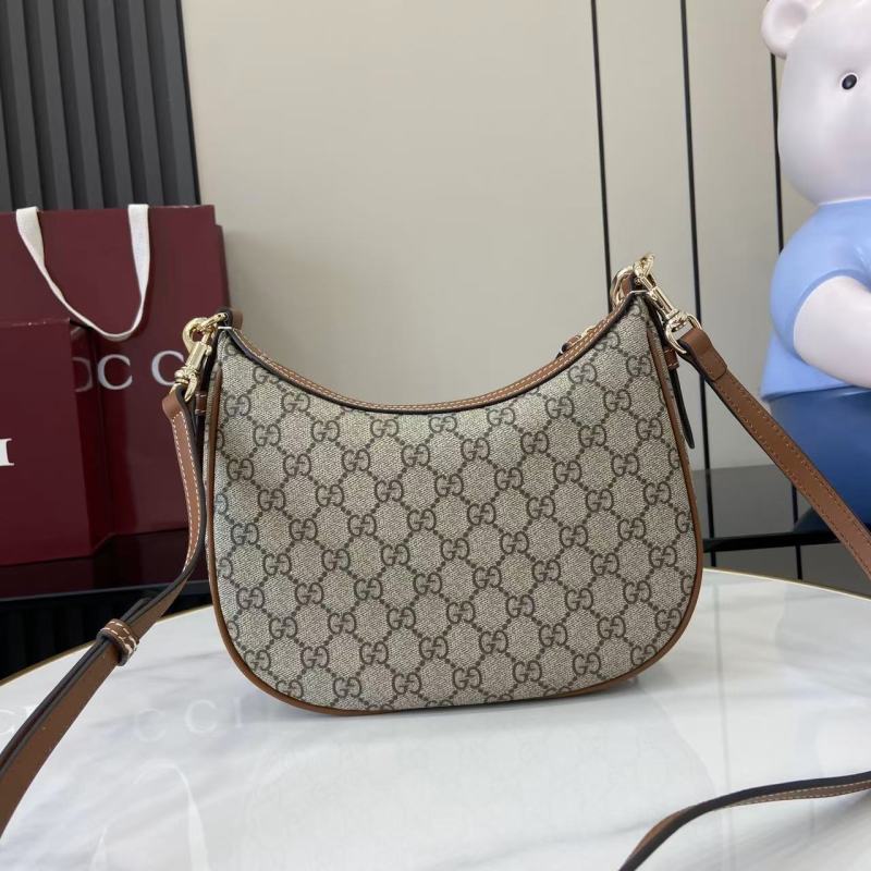 Сумка Gucci с цепочкой и принтом GG