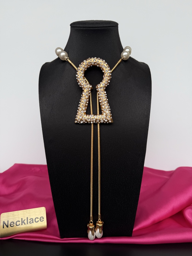 Колье в виде ключа с жемчугом Schiaparelli