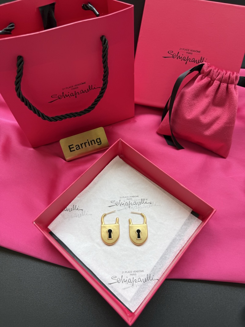 Серьги в форме замка Schiaparelli