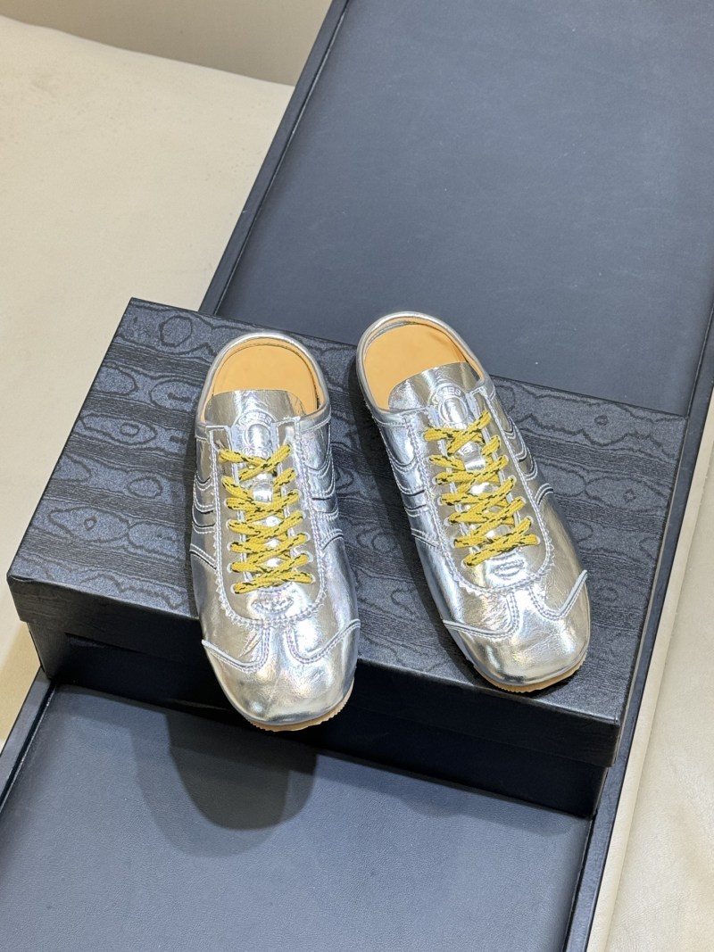 Серебристые женские мюли Dries Van Noten с желтым шнурком