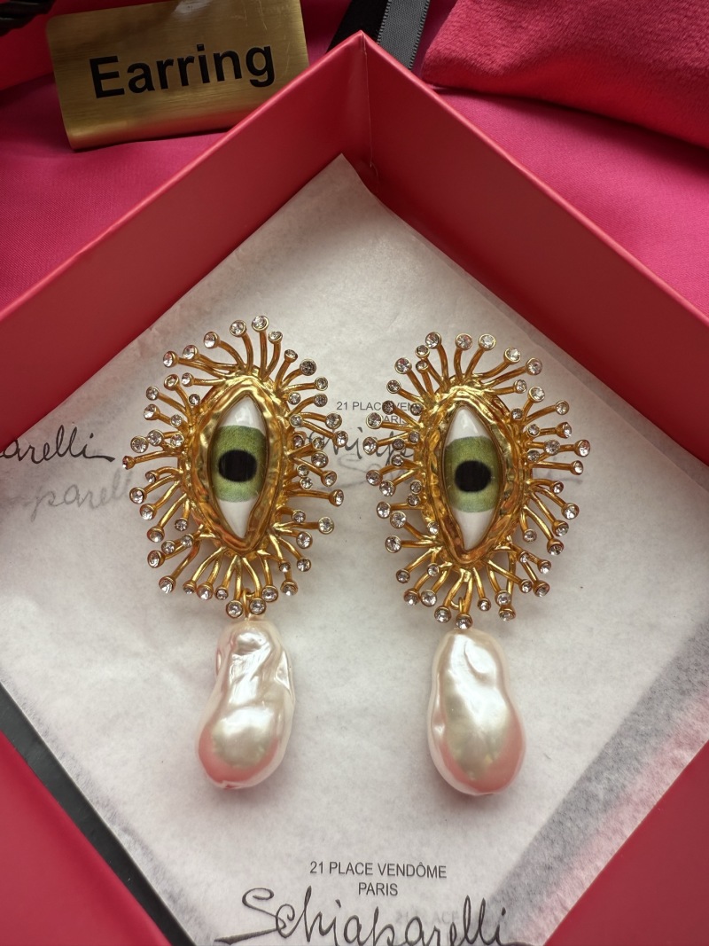 Серьги с глазом и жемчугом Schiaparelli