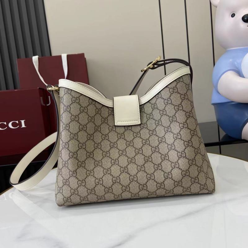 Сумка Gucci с замком и плечевым ремнем